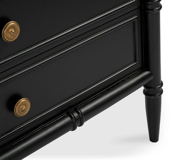 Lower corner of nightstand showing leg and bevel details.