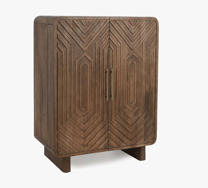 Side/front three-quarter view of cabinet showing carved doors and legs
