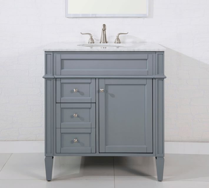 Grey vanity with marble top and chrome faucet