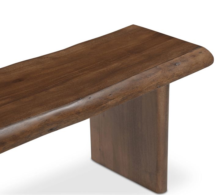 Close-up of the rounded edge and corner of bench surface.