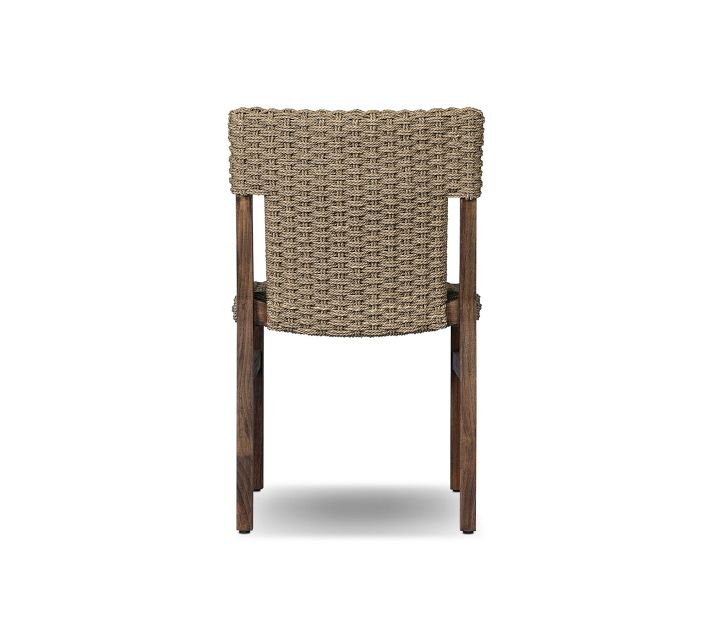 Rear view of woven rattan chair showing backrest weave and wooden frame