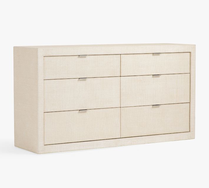 Full frontal view of a light beige dresser with six drawers (two columns, three rows) closed.