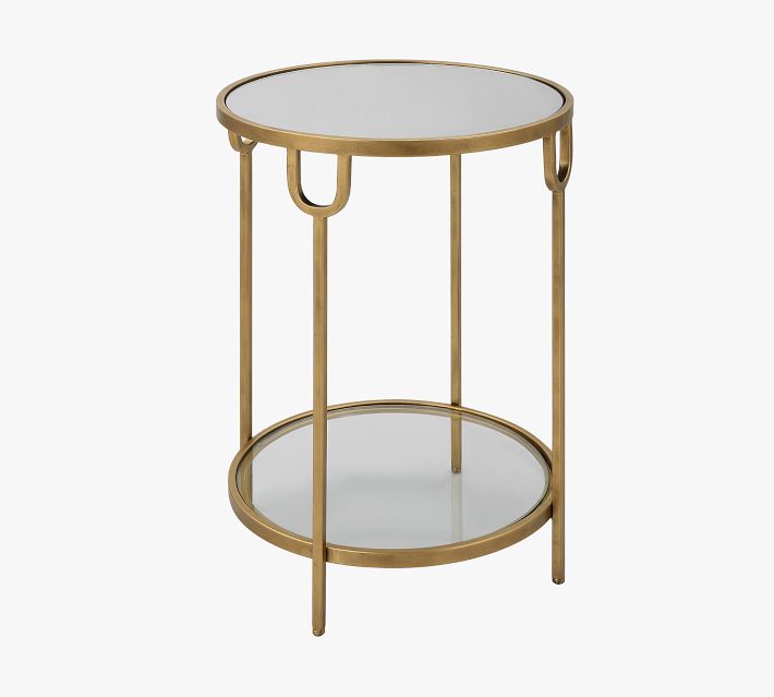 Gold metal round side table with two-tier glass surfaces and vertical legs, shown from a frontal angle.