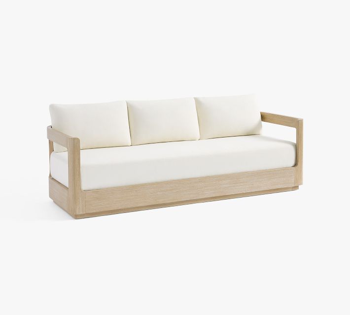 A white two-seater sofa with wooden frame and two back cushions