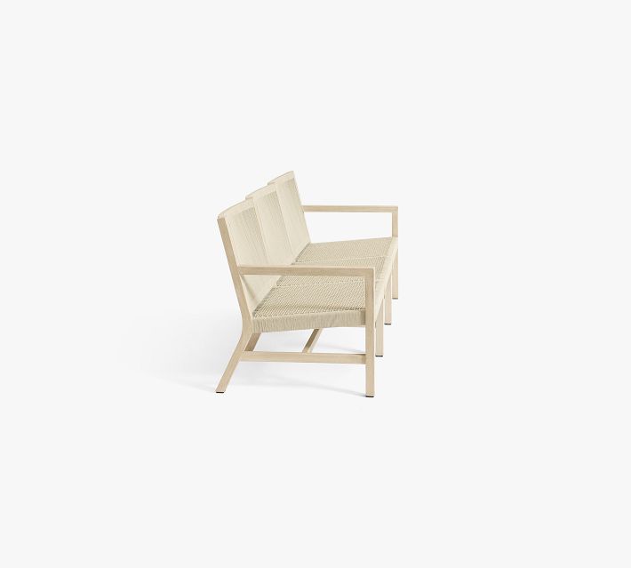 Two-seater outdoor chair with woven seat and back against white background.
