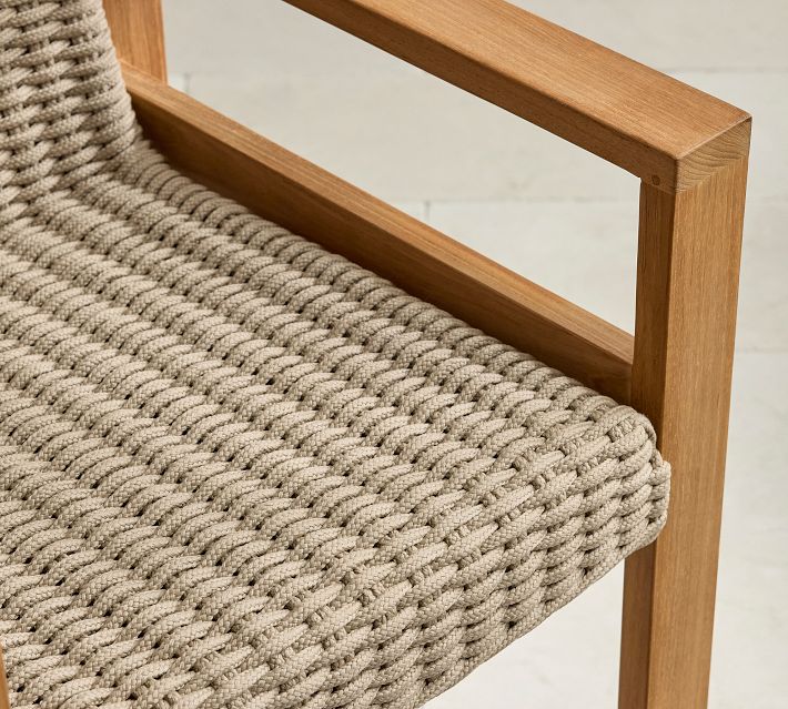 Close-up of the arm and woven seat, showing rope weave and wood frame join.