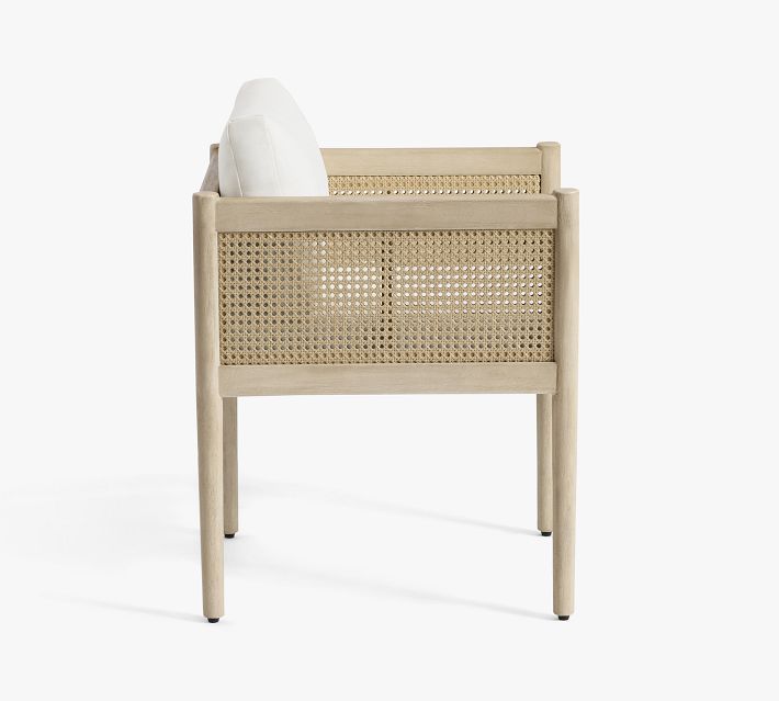 Back view of an armchair showing woven side panels