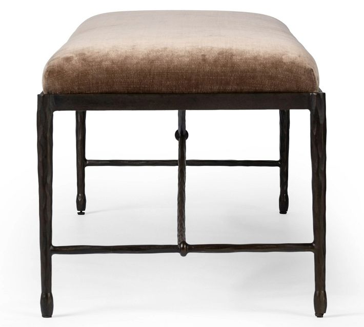 Front view of the bench highlighting curved metal footrest and brown cushioned seat.