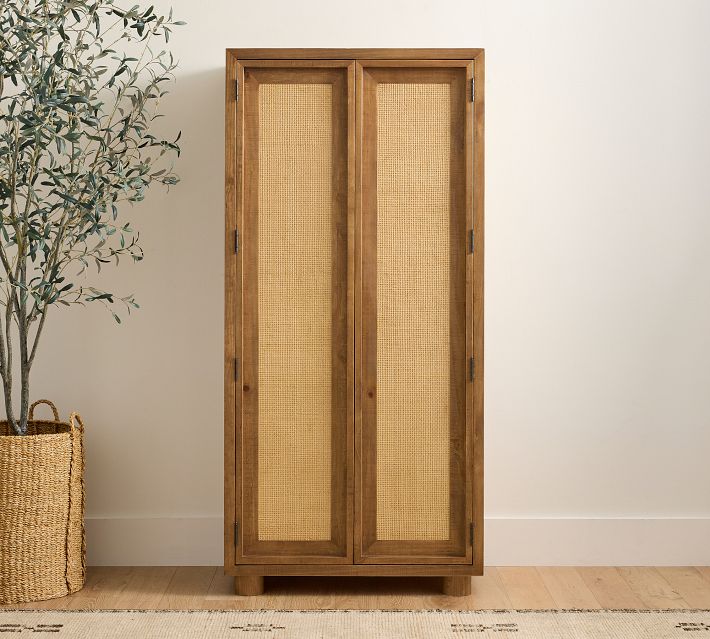 Wooden cabinet with two woven rattan doors, mid-century style.