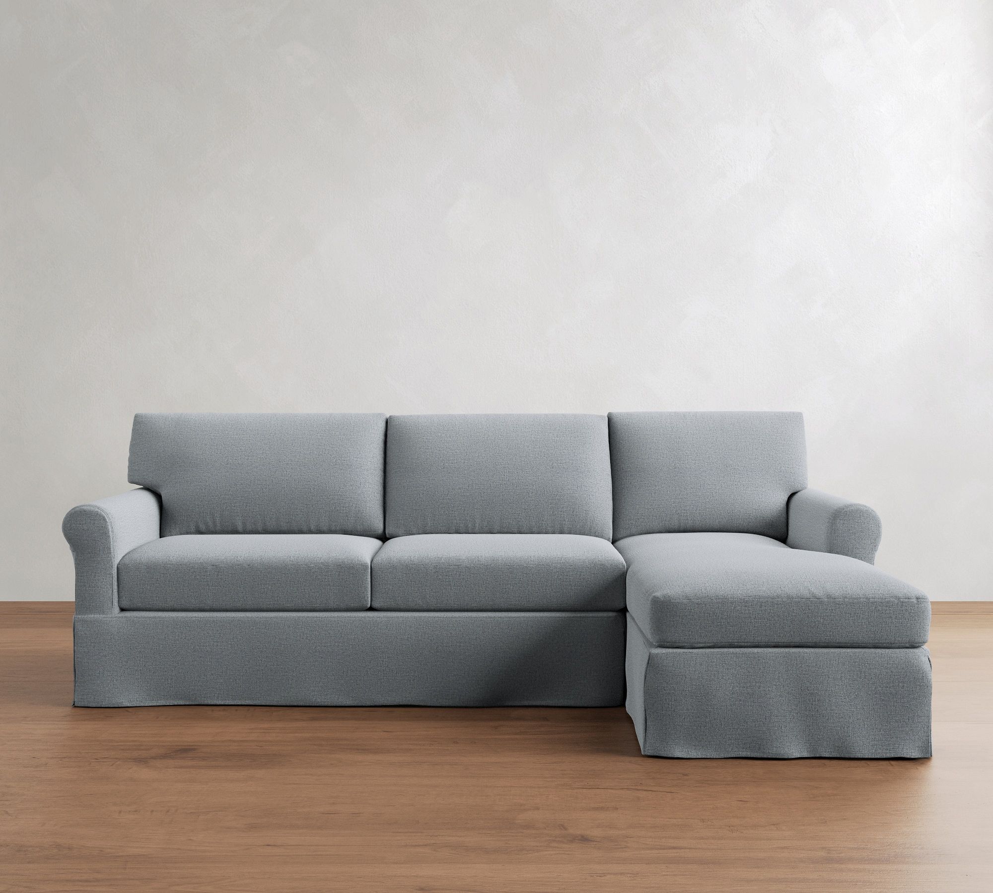 York Roll Arm Slipcovered Chaise Sleeper Sectional (119")