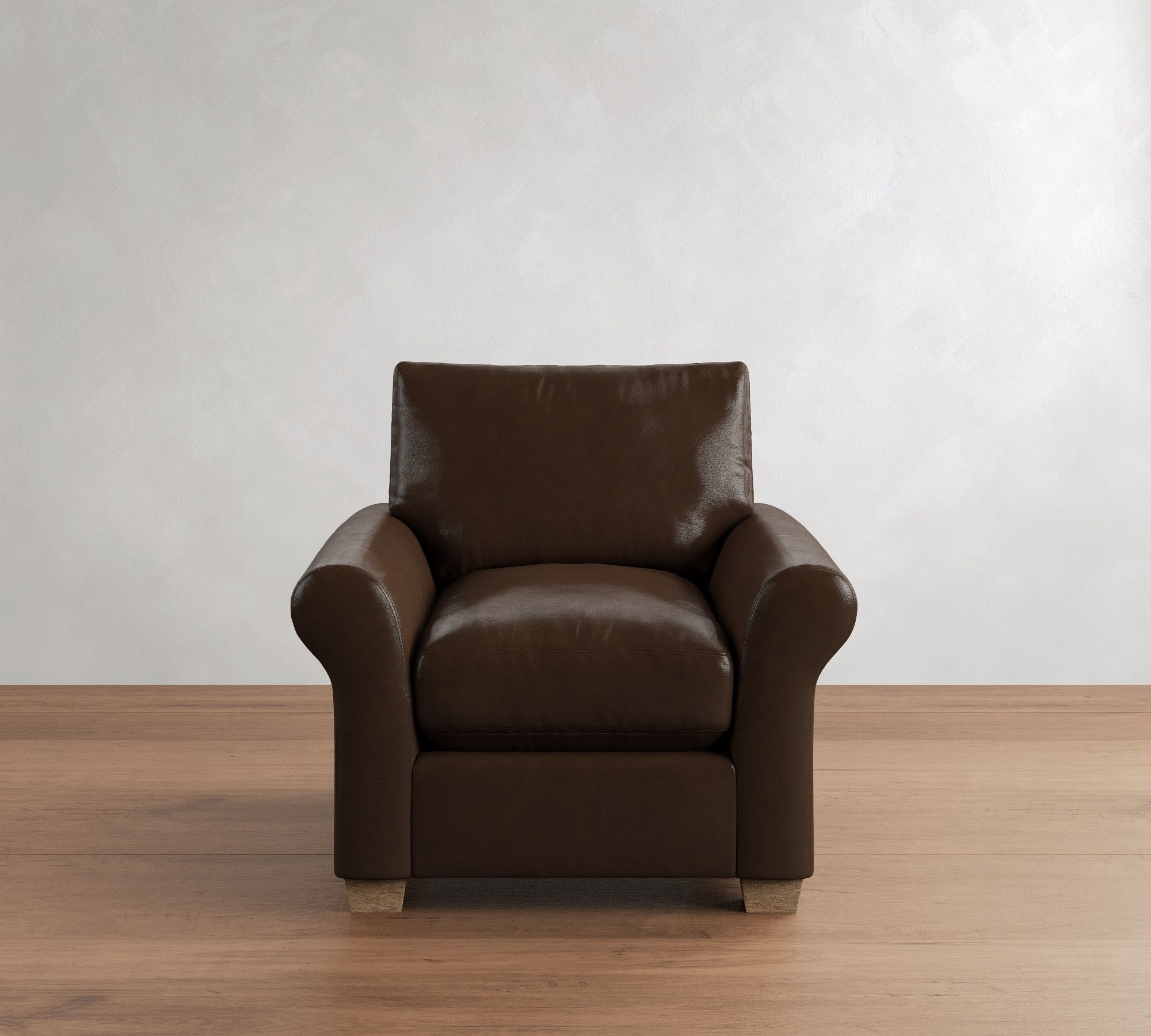 Front view of dark brown leather armchair