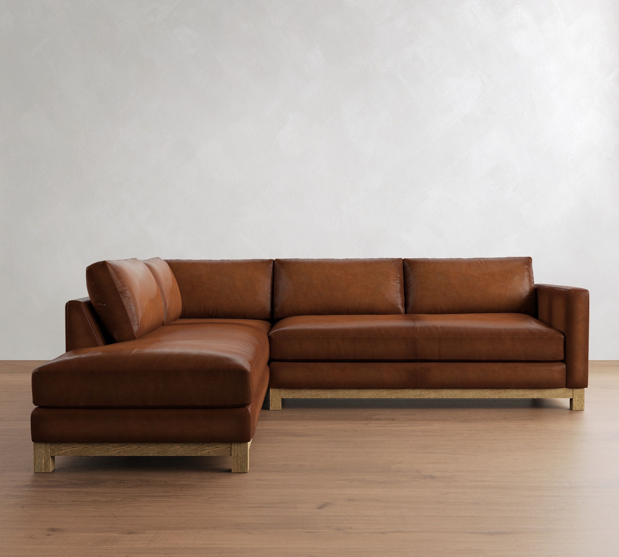 Jake Leather Seadrift Wood Base Return Bumper Sectional (108"-112")