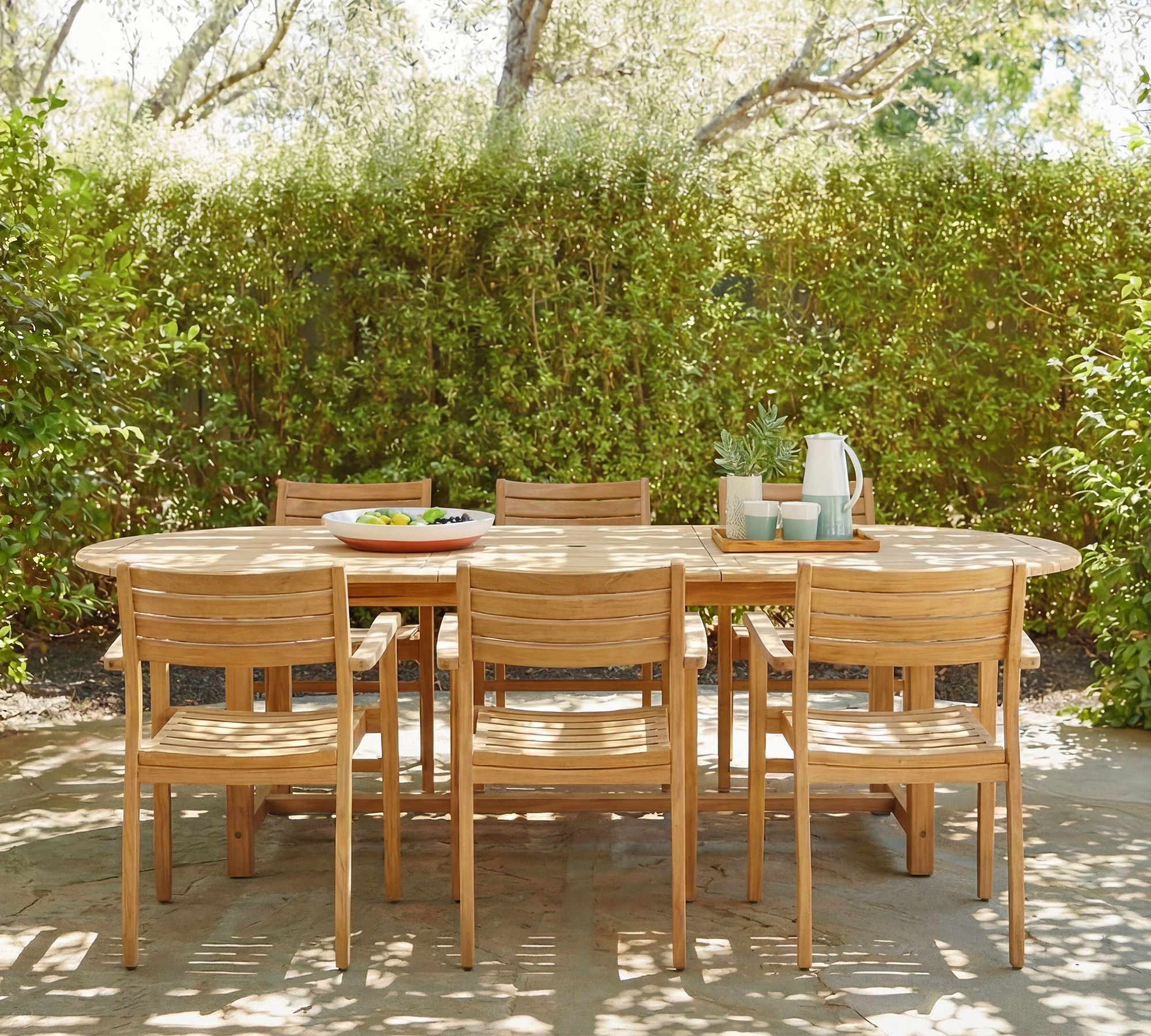 Nassau Teak Oval Outdoor Table with Monza Stackable Dining Armchair Set