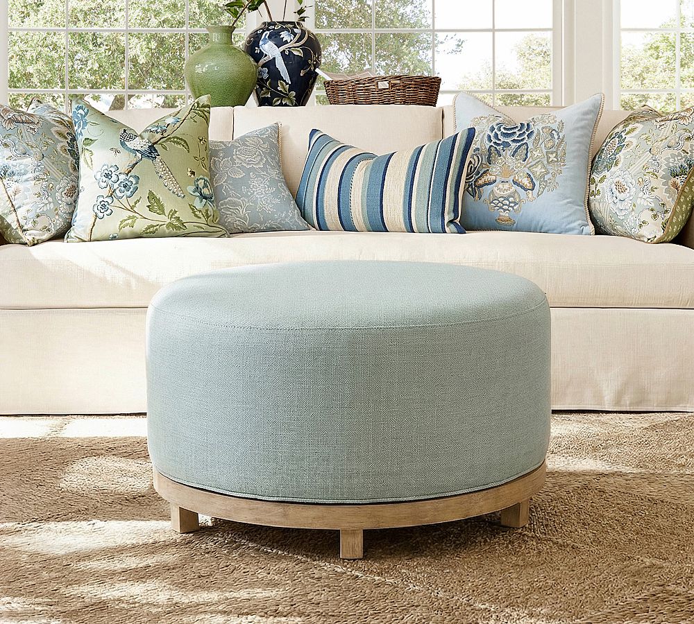 Jake Swivel Upholstered Wood Base Ottoman by Pottery Barn