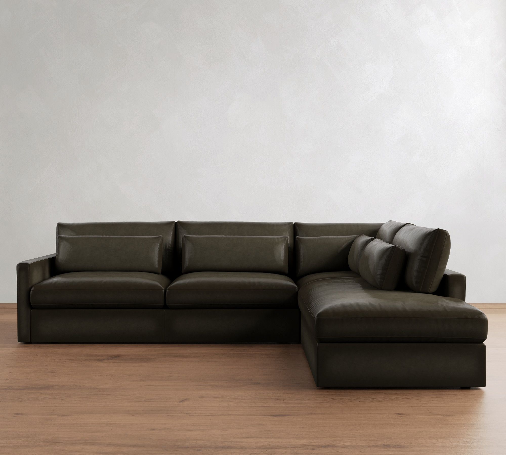 Westwood Slim Arm Deep Seat Leather Return Bumper Sectional (119"-131")