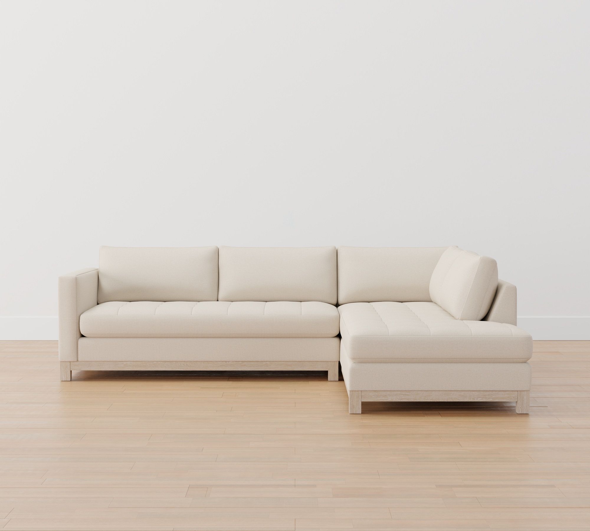 Jake Tufted Seadrift Wood Base Return Bumper Sectional (110")