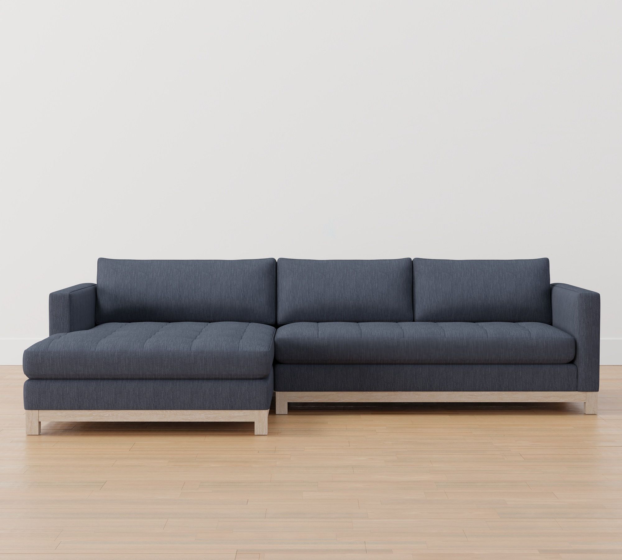 Jake Tufted Seadrift Wood Base Chaise Sectional (110"&ndash;120")