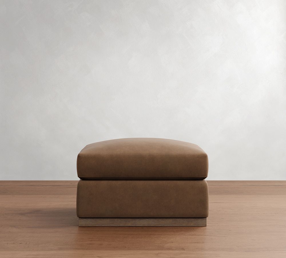 Carmel Wide Arm Leather Wood Base Ottoman by Pottery Barn