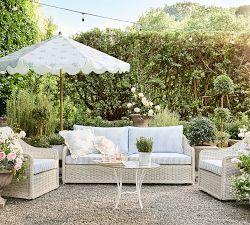 LoveShackFancy Wicker Swivel Outdoor Lounge Chair