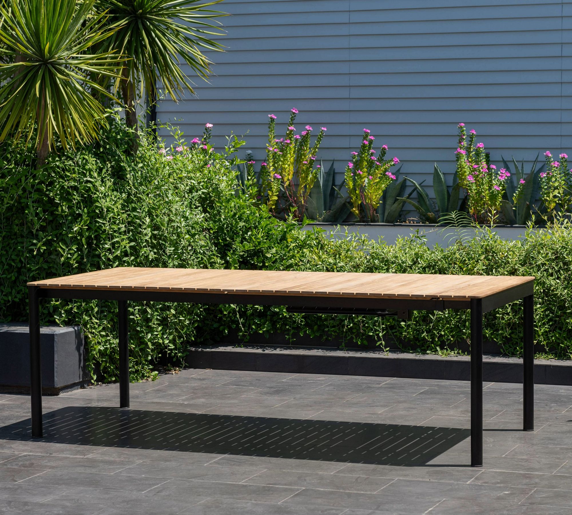 Zia Teak Outdoor Extendable Dining Table (89"-130")