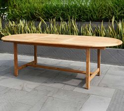 Nassau 9-Piece Teak Oval Outdoor Table (71"-95") + Placid Armchair Set